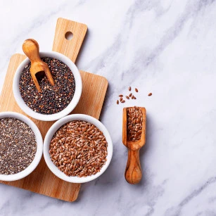 Image of flaxseeds on wooden board