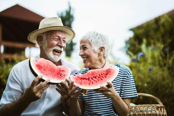 Lovely couple eating water melon